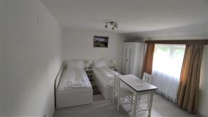 Postel nebo postele na pokoji v ubytování Casa Sommer
