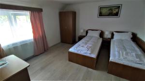 Postel nebo postele na pokoji v ubytování Casa Sommer