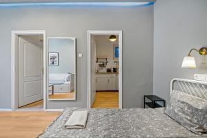 Posteľ alebo postele v izbe v ubytovaní Venus Apartments - Akacfa II