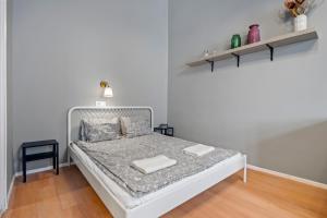 Posteľ alebo postele v izbe v ubytovaní Venus Apartments - Akacfa II