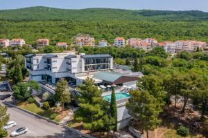 an aerial view of a villa with a swimming pool at Hotel Ad Turres in Crikvenica