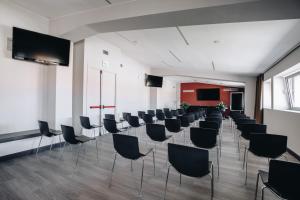 TV a/nebo společenská místnost v ubytování Hotel Continental