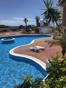 Bazén v ubytovaní Blue Sky Paraiso alebo v jeho blízkosti