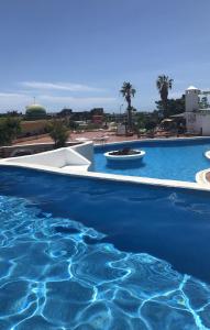 Bazén v ubytovaní Blue Sky Paraiso alebo v jeho blízkosti