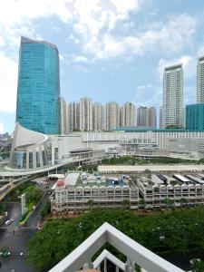 a view of a city with tall buildings at Super Cozy 2BR Apt with direct access to Mall in Jakarta