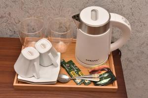 Oprema za pripravo čaja oz. kave v nastanitvi Hotel & Restaurant Sokhumi