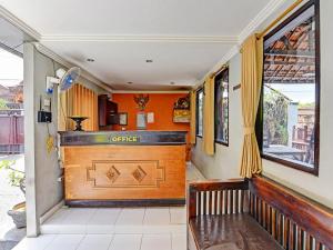 a bar in the hallway of a house at Hotel Diana 1 in Denpasar