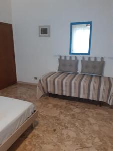 Posteľ alebo postele v izbe v ubytovaní Scala Apartment