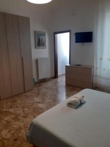 Posteľ alebo postele v izbe v ubytovaní Scala Apartment