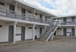 a building with a staircase in a parking lot at The Longshoot in Nuneaton