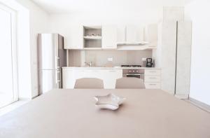 A kitchen or kitchenette at La Terrazza di Walter