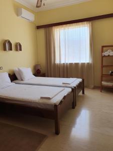 Posteľ alebo postele v izbe v ubytovaní Sunny House