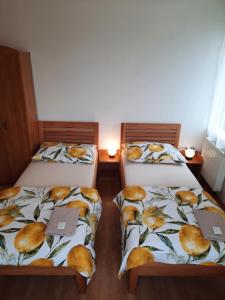 Postel nebo postele na pokoji v ubytování Penzion U Mnicha