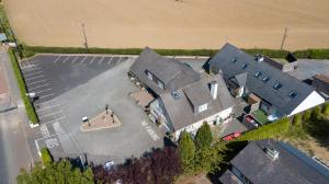 an overhead view of a large building with a parking lot at Aisling Guest House in Ashbourne
