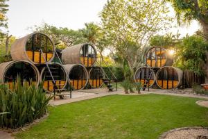 a pod house in the garden at Pipe House Playa Grande in Playa Grande
