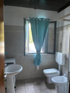 A bathroom at Camera graziosa