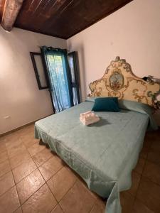 A bed or beds in a room at Camera graziosa