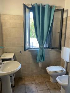 A bathroom at Camera graziosa