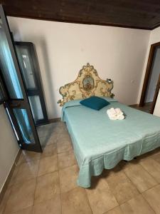 A bed or beds in a room at Camera graziosa