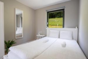 Postel nebo postele na pokoji v ubytování Cozy House