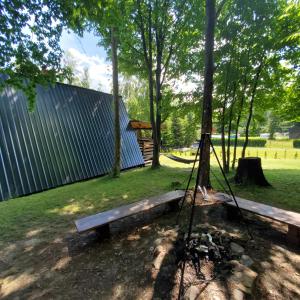 En trädgård utanför RESET W WERLASIE- Domek na wyłączność- kajak w cenie