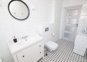Kúpeľňa v ubytovaní Apartamenty 4YOU Hel + 21 fotografií