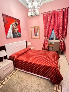 A bed or beds in a room at Guest House Biondi