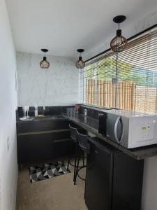 Fotografie z fotogalerie ubytování Alto da Piraquara Flat v destinaci Angra dos Reis