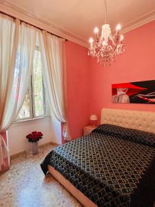A bed or beds in a room at Guest House Biondi
