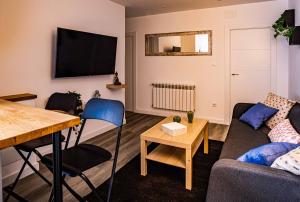 TV a/nebo společenská místnost v ubytování Apartamento Cimavilla en Gijón