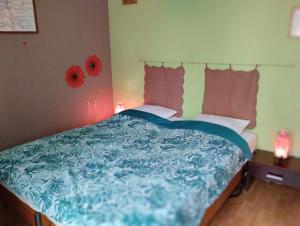 Posteľ alebo postele v izbe v ubytovaní La petite maison de Paule