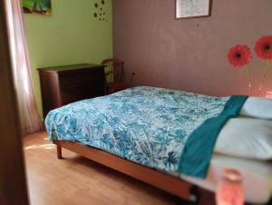 Posteľ alebo postele v izbe v ubytovaní La petite maison de Paule