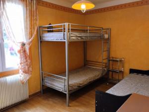Posteľ alebo postele v izbe v ubytovaní La petite maison de Paule