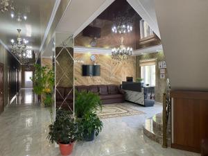 TV a/nebo společenská místnost v ubytování Asem Guest House