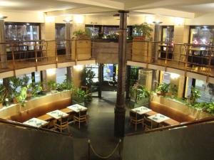ห้องอาหารหรือที่รับประทานอาหารของ Hotel Le Dome