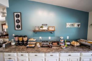 a kitchen with a counter with food on it at Ephraim Motel in Ephraim