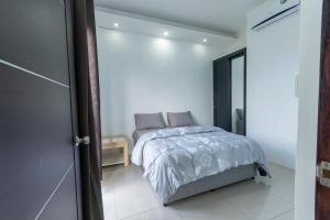 Postel nebo postele na pokoji v ubytování ISLAND RESIDENCE Plaisance - Mauritius - Villa with Private Pool - 15718 + 6 fotografií