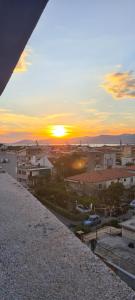 a view of a sunset from a building at SmartStar in Split