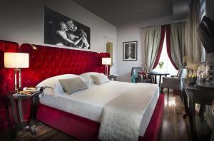 Letto o letti in una camera di Grand Amore Hotel and Spa - Ricci Collection