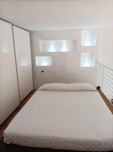 En eller flere senger på et rom på Il Nido Bilocale Niguarda