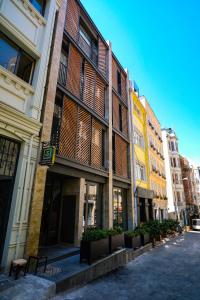 a row of buildings on a city street at Galata Rasso Hotel in Istanbul