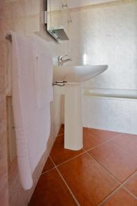 Ванная комната в Apartamentos Os Descobrimentos
