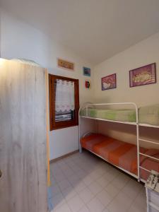 Postel nebo postele na pokoji v ubytování Villetta a 350 m dal mare