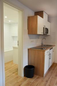 a kitchen with a sink and a counter top at Unterkunft in Bergneustadt in Bergneustadt