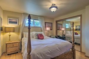 a bedroom with a bed and a large mirror at Denver Home with Large Yard and Private Lake Access! in Denver