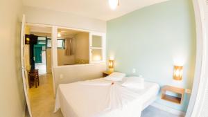 เตียงในห้องที่ Porto Paúba +22 ภาพ