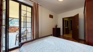 Postel nebo postele na pokoji v ubytování Apartmán Olívia 8 Hrabovská dolina