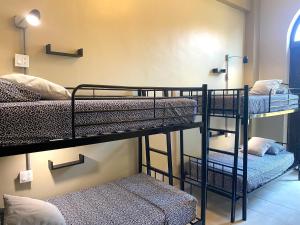 Cama ou camas em um quarto em Magnolia Inn