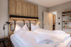 ALPINE INN Davos客房内的一张或多张床位