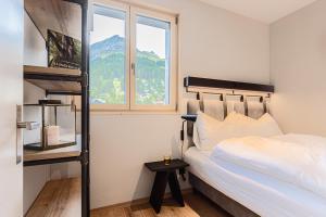 ALPINE INN Davos客房内的一张或多张床位